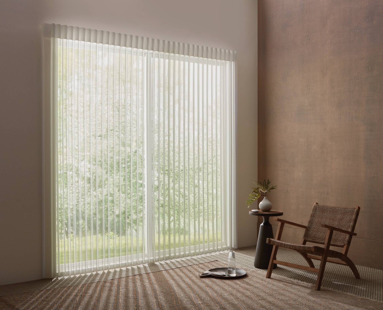 Hunter Douglas Luminette® Sheer Panels with Open Vanes in a Minimal Seating Area at Window Accents & Flooring near Princeton, NJ