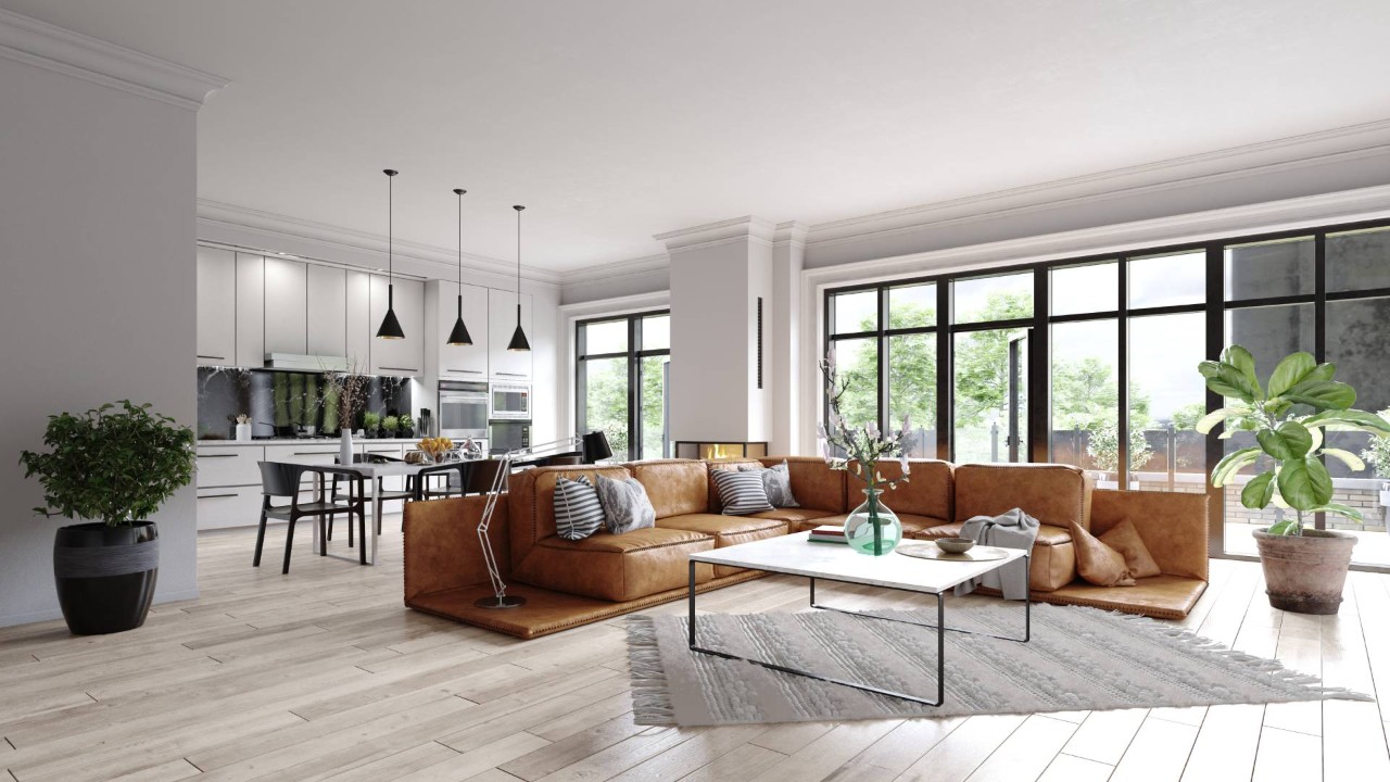 Modern refreshed living room with large windows and an open kitchen in the background at Window Accents & Flooring near Princeton, NJ
