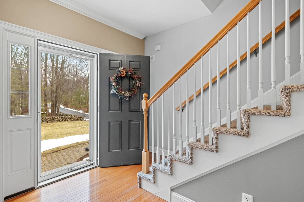 Fresh layer of epoxy for floors, making the home's hardwood floors shine at the entryway at Window Accents & Flooring near Princeton New Jersey (NJ)